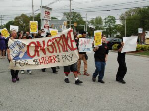 About 25 demonstrators gathered at the Wendy's at 771 Warwick Ave., Warwick to call for a $15 minimum wage for fast food workers May 15.