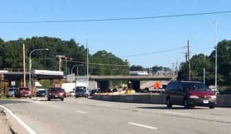 A view of Rte. 2 facing north, with a view of construction on Barton Corner Bridge over Rte. 95.