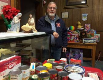 Lincoln Smith with the food and toys to be donated to Family Shelter of Warwick by PSRI.