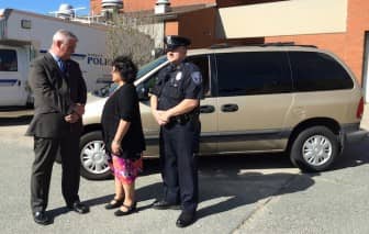 From left, Mayor Scott Avedisian, Council President Donna Travis, and Warwick Police Explorers Director Al Melucci.