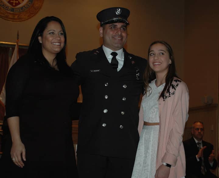 [CREDIT: Rob Borkowski] Gerard Begosian, promoted to Rescue Captain, with his wife Corinne and daughter, Julia.