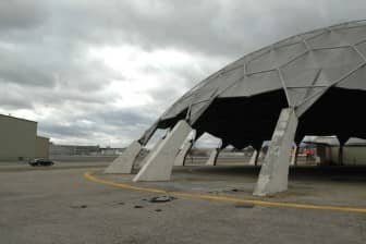 [CREDIT: Rob Borkowski] Traffic on Airport Road passes between TF Green Airport and the Airport Road dome. 