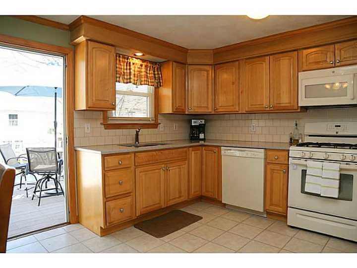 [CREDIT: Statewide MLS] The kitchen inside 136 Green River Ave., looking out at the deck.