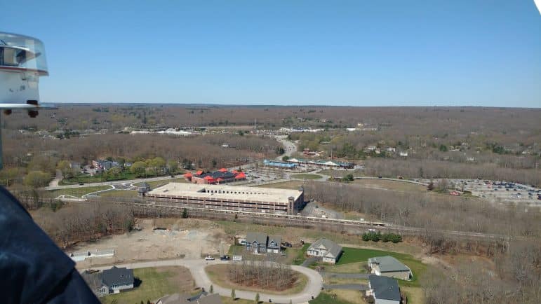 [CREDIT: Lt. Bill Wilson] Wickford train station is visible in the distance from the top of the NK wind turbine.