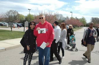 [CREDIT: Rob Borkowski] Thomas Healey and Christine Mainey of Warwick wait at Crowne Plaza to hear Donald Trump speak April 25. 