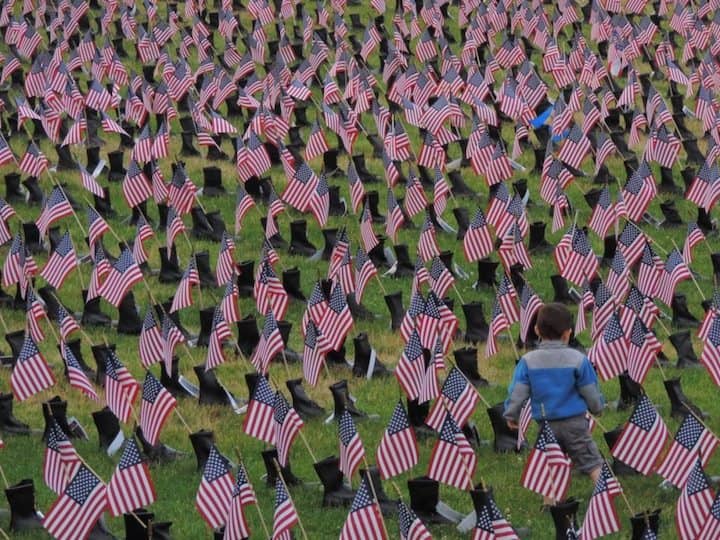 [CREDIT: Lincoln Smith] The Boots on the Ground exhibit honoring the men and women who have died in service since Sept. 11, 2001.