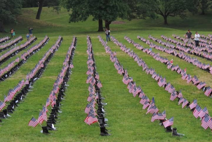 [CREDIT: Lincoln Smith] The Boots on the Ground exhibit honoring the men and women who have died in service since Sept. 11, 2001.