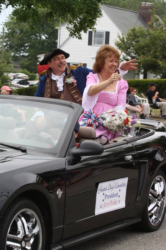 [CREDIT: Beth Hurd] Gaspee Days Committee president Gerry Peshka rides in style, waving to an appreciative crowd.