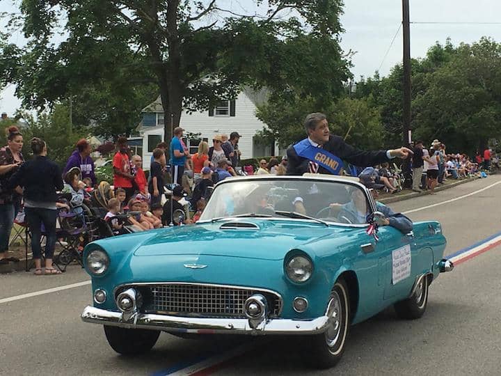 [CREDIT: Beth Hurd] NBC 10's Gene Valicenti, the Grand Marshal for the 2016 Gaspee Days Parade, waves to the crowd June 11.