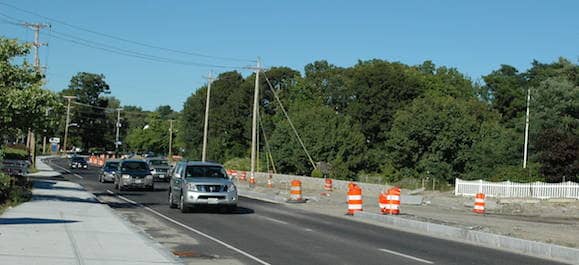 [CREDIT: Rob Borkowski] Veterans Memorial Drive, currently a one-way road. The dirt part of the road, currently out of service, will handle traffic in the other direction once the Veterans Memorial Drive Extension is finished, and connects the roundabouts on either end of the new stretch of road.