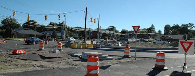 [CREDIT: Rob Borkowski] The Toll Gate, Centerville Road and Gilbane Street roundabout, from the viewpoint of Veterans Memorial Drive Extension.