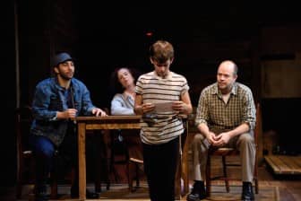 [CREDIT: Mark Turek] Matthew Dean as Billy learns his fate in a letter from the Royal Ballet School, while (from left) Zaven Ovian as Tony, Sarah Polen as Grandma and Christopher Swan as Dad look on.