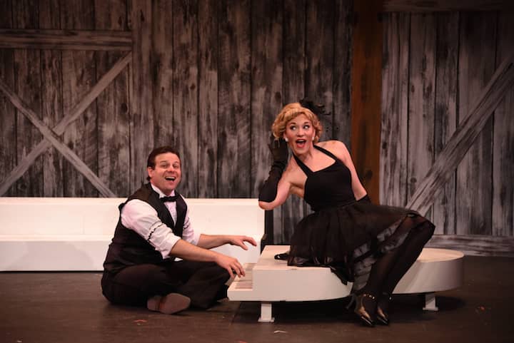 Joel Kipper as Phil Davis and Maria Logan as Judy Haynes sing “I Love a Piano” in White Christmas at OSTC.