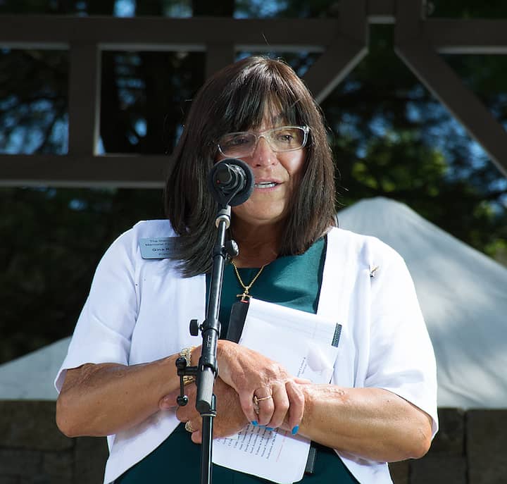 [CREDIT: Mary Carlos] Gina Russo speaks during the Station Fire Memorial dedication.