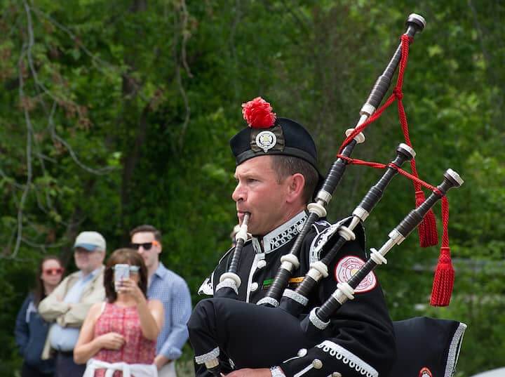 [CREDIT: Mary Carlos] A bagpiper with the Warwick/West Warwick Honor Guard at the start of the Station Fire Memorial Dedication.