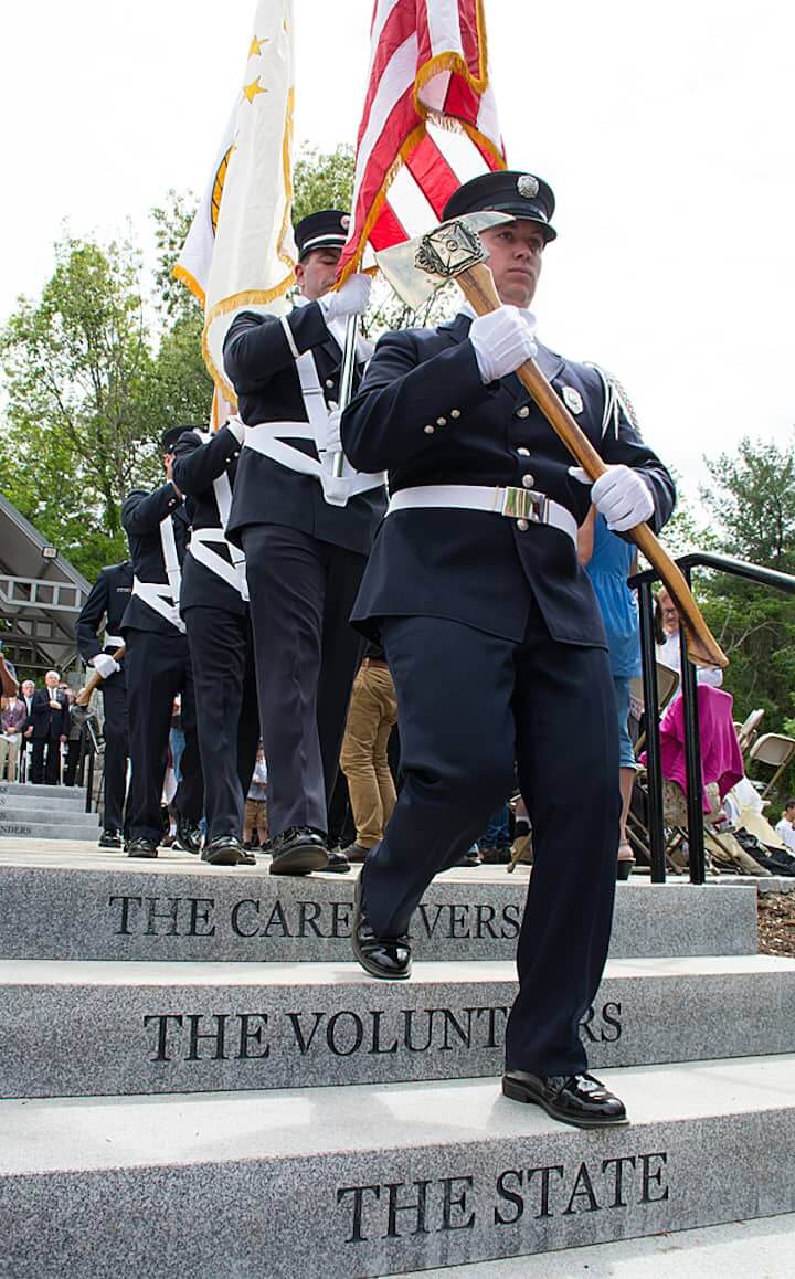 [CREDIT: Mary Carlos] The Warwick/West Warwick Honor Guard prepares for the start of the Station Fire Memorial dedication.