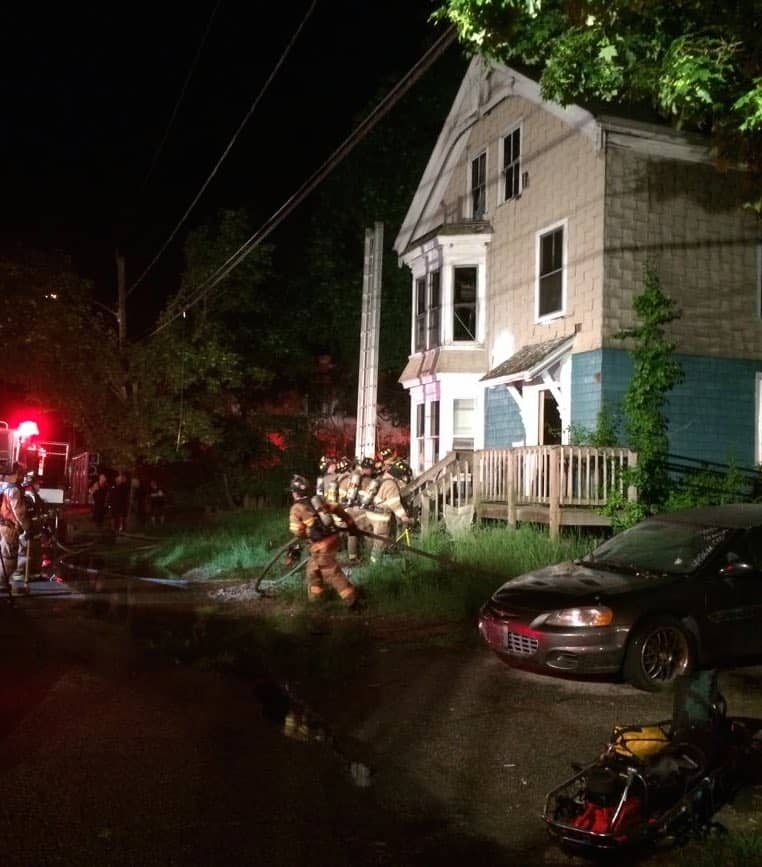 [CREDIT: Chris Palmer] Firefighters battled a fire affecting the exterior of the building Saturday night.