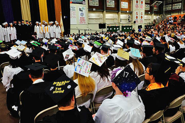 [CREDIT: Lauren Kasz] Graduates proudly displayed their custom-designed mortar boards at the Pilgrim High School Class of 2017 graduation.