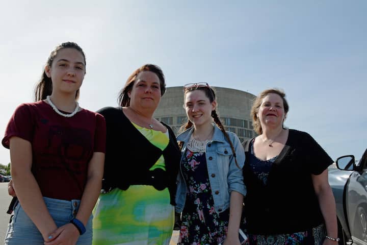 [CREDIT: Rob Borkowski] Alina Jencks, her daughters Lisa and Abbey and sister Lee-Ann Bruhn were at CCRI Tuesday to see Wyat Jencks graduate. 