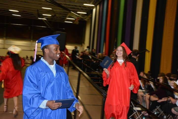 [CREDIT: Rob Borkowski] New Toll Gate Graduates show off their diplomas.