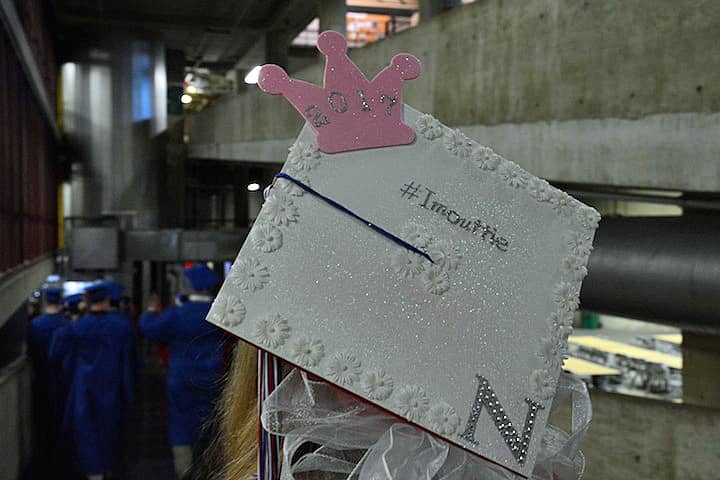 [CREDIT: Rob Borkowski] Nadia Xavier's mortar board has a spirited hashtag parting remark.