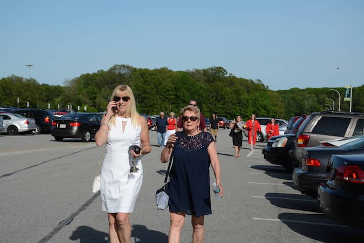 [CREDIT: Rob Borkowski] Allison Godfrey and Tina Demers arrive to watch Kate Godfrey graduate Tuesday at CCRI. "She's a great girl," Godfrey said.