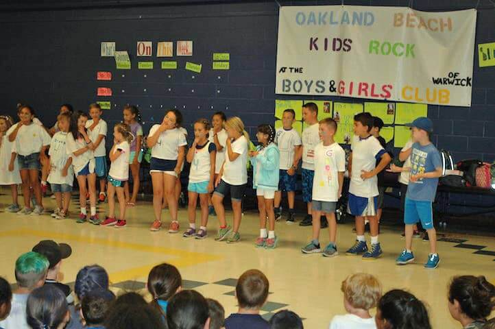 [CREDIT: Rob Borkowski] Boys & Girls Club Group 4, comprised of kids headed to the fourth grade, perform at the Oakland Beach location Friday.