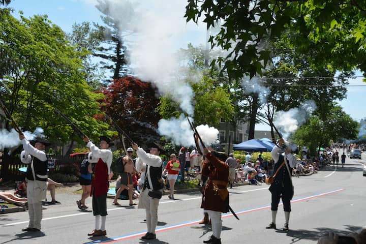 [CREDIT: Rob Borkowski] The Gloucester Light Infantry Military Militia fire their muskets at the start of the Gaspee Days Parade June 9, 2018.