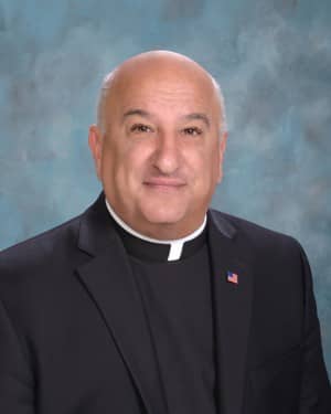 [CREDIT: Bishop Hendricken High School] Fr. Robert Marciano will lead Bishop Hendricken High School in 2019.