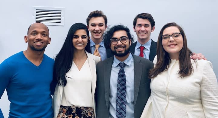 [CREDIT: Emmerson College] The IPDA winners group at St. Anselm in November, from left, top row: William Rowley, Jack Degnan Bottom row: Deion Hawkins (coach), Jenna Dewji, Karthik Ramaswami, Sara Hathaway, of Warwick, RI.