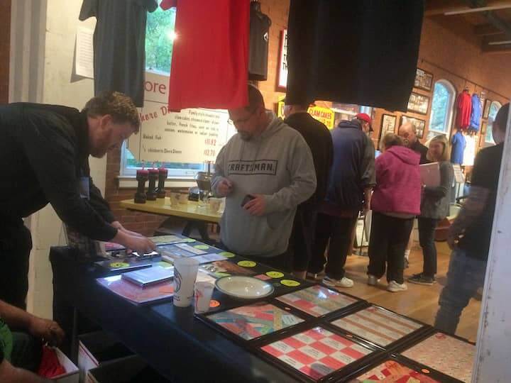 [CREDIT: Rob Borkowski] Volunteers helped sell Rocky Point merchandise during the opening reception.