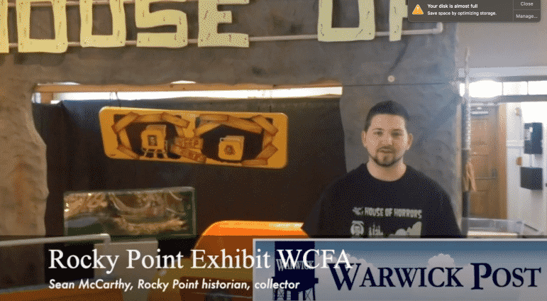 [CREDIT: Rob Borkowski] Sean McCarthy, Rocky Point collector and historian, shows off the Remembering Rocky Point! exhibit at the Warwick Center for the Arts.