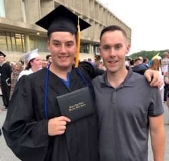 {CREDIT: Kim Wineman] Brandon & Ryan Watkins pose for a post-graduation snapshot Wednesday at CCRI.