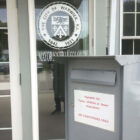 [CREDIT: Rob Borkowski] A tax and utility bill drop box outside the Buttonwoods Community Center. Many property tax bills were delivered this week, two business days before the July 15 due date.