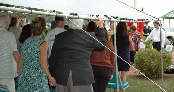 [CREDIT: Rob Borkowski] At the end of Warwick's Sept. 11 memorial ceremony, Rep. Camille Vella Wilkinson asked the crowd to hold hands.