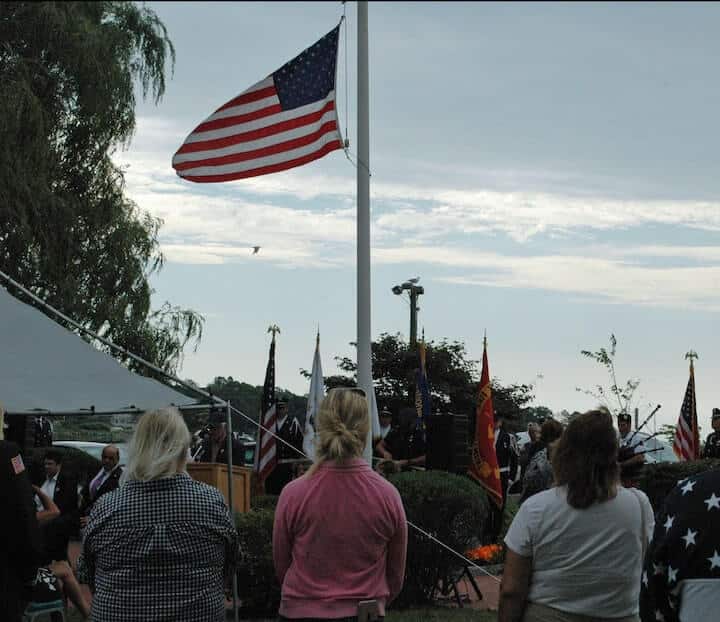 [CREDIT: Rob Borkowski] School Committee member Nathan Cornell played taps at Wednesday's Sept. 11 memorial ceremony. 