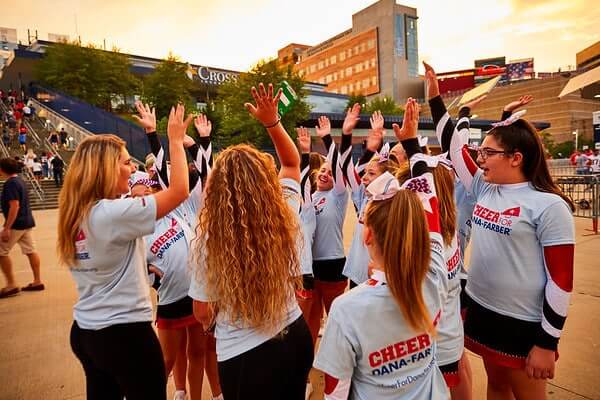 [CREDIT: Josh Campbell] Warwick Patriots Cheerleaders high-five during the 2019 Cheer for Dana-Farber game day performance for fundraising winners at Gillette Stadium on Aug. 22.