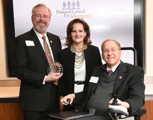 [CREDIT: Congressman Jim Langevin's office] Langevin receiving the National Council for Adoption’s ‘Friend of Adoption Award’ at Langevin's DC office.