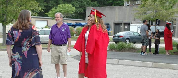 [CREDIT: Rob Borkowski] Tollgate 2020 graduates Zoe Estrella and Rose Flaherty.