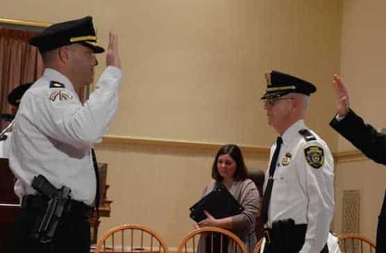 [CREDIT: Rob Borkowski] Maj. Brad Connor, recently promoted, was honored for achieving the rank in April 2017. At right, former WPD Chief Col. Stephen McCartney stands with former Mayor Scott Avedisian to formalize the promotion. Connor has been named the next WPD Chief by incoming Mayor Frank Picozzi.