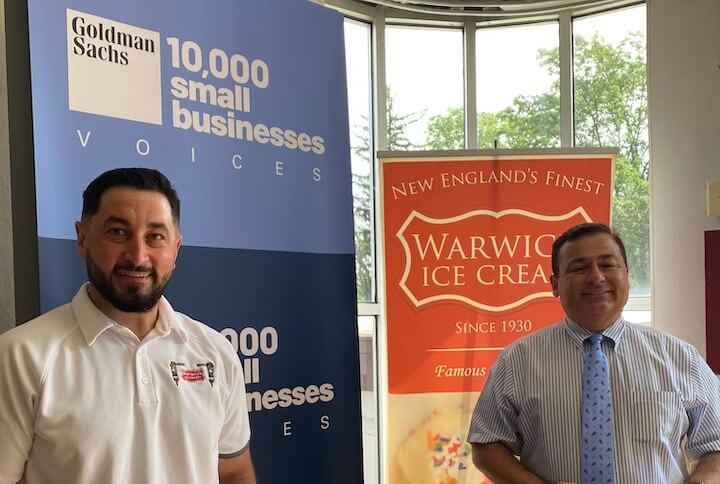 [CREDIT: Goldman Sachs] From left, Thomas Bucci of Warwick Ice Cream and RI Speaker Joseph Shekarchi at Warwick Ice Cream discuss challenges the small business faces.