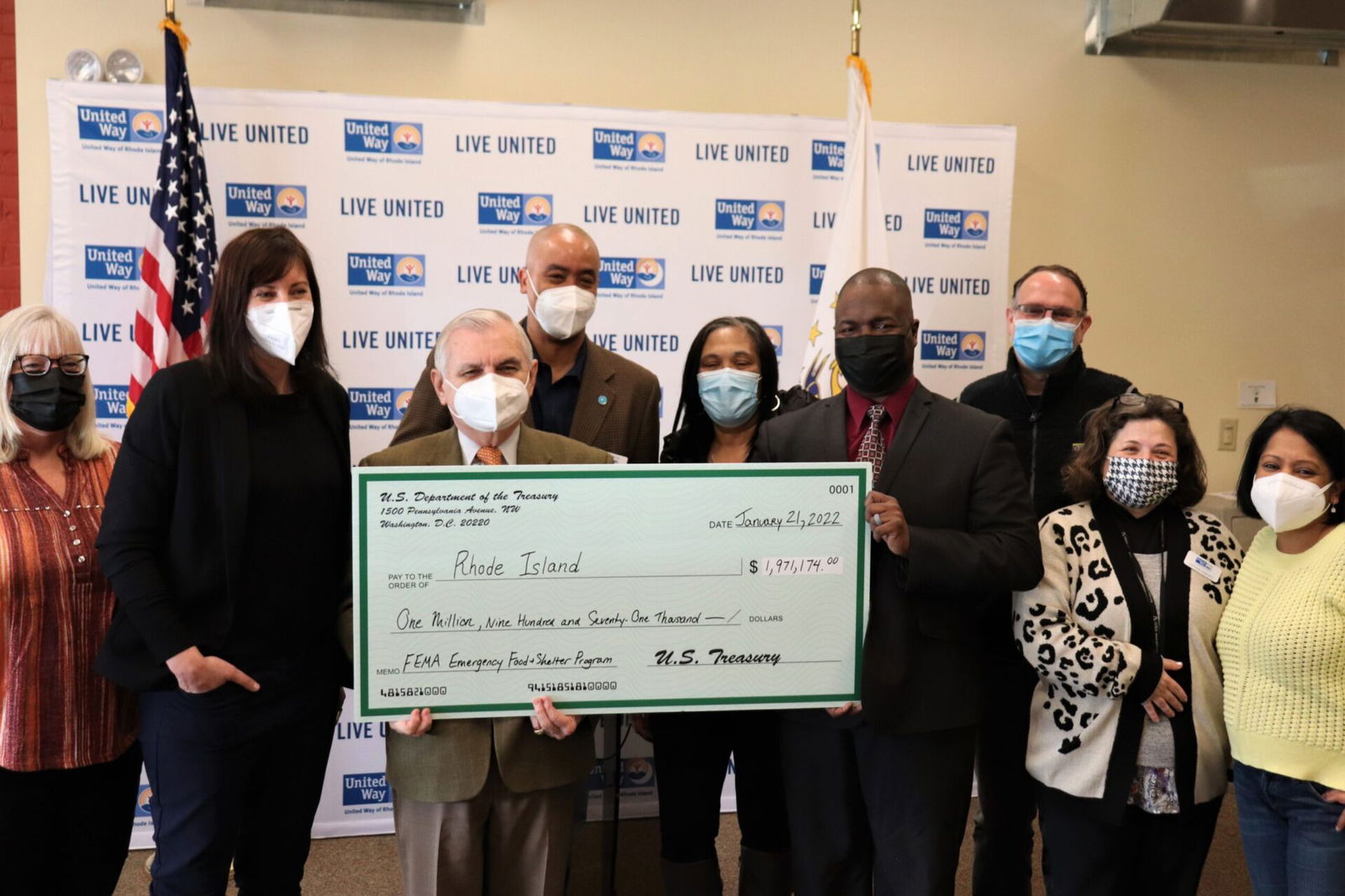 [CREDIT: Sen. Jack Reed's Office] US Sen. Jack Reed (D-RI) and Larry Warner Chief Community Impact and Equity Officer at United Way RI, show off a check for nearly $2 million to aid the hungry and homeless in RI>