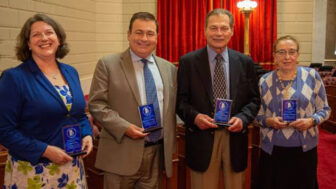 [CREDIT: LPPIB] From left, Sen. Dawn Euer, House Speaker K. Joseph Shekarchi, Senate President Dominick J. Ruggerio and Rep. Lauren H. Carson with their Clean Water Association Legislator of the Year awards.