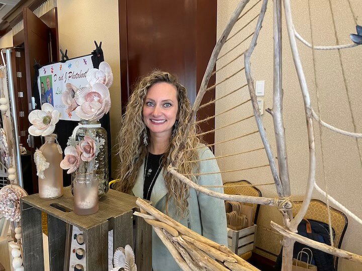 [CREDIT: Rob Borkowski] Alana Almonte, artist and owner of Anchored Soul in Cranston, with some of her shell and stone creations.