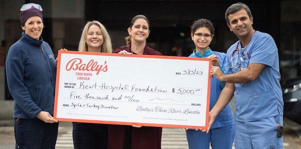 [CREDIT: Kent Hospital] From left, Dr. Laura Forman, emergency medicine physician, Kent Hospital, Kate Wishart, major gifts officer, Kent Hospital, Kim Ward, regional executive director of Public & Community Affairs at Bally’s Twin River Casino, Dr. Hadeel Zainah, Kent Hospital, and Dr. Jinen Thakkar, Kent Hospital. Bally's representatives presented the Bally's Twin River donation this week.