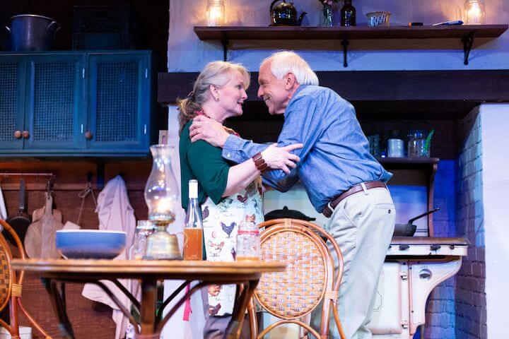 [CREDIT: Cat Laine] From left, Candice Brown (playing Hazel) and Richard Donelly (playing Robin) in The Gamm Theatre's production, "The Children" about a couple weathering the figurative and literal fallout of a nuclear disaster.