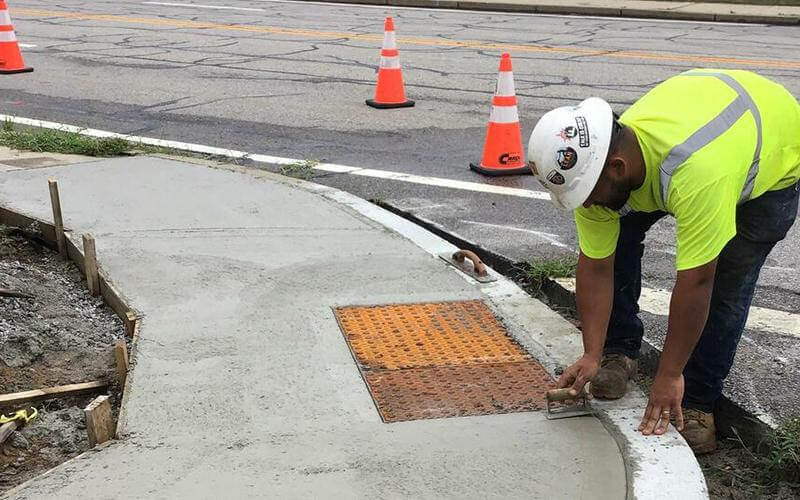 [CREDIT: RIDOT] A construction worker checks ongoing work on Airport Connector ramps from and to Post Road.