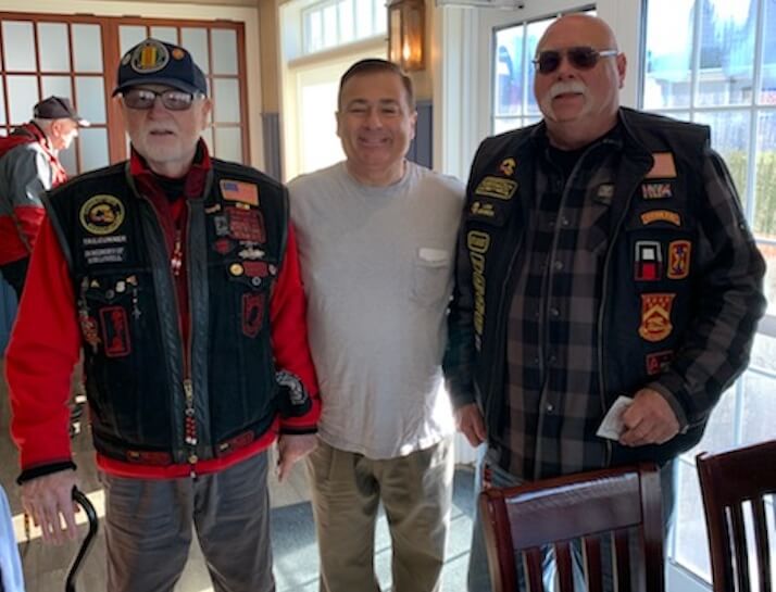 [CREDIT: Courtesy Kim Wineman] From left, Dan Thurston, known to friends as Popeye, RI Speaker of the House Joseph Shekarchi, and Gary Rehak, Veterans Motorcycle Association of RI, during Iggy's free Veterans Day breakfast Saturday, Nov. 11, 2023.