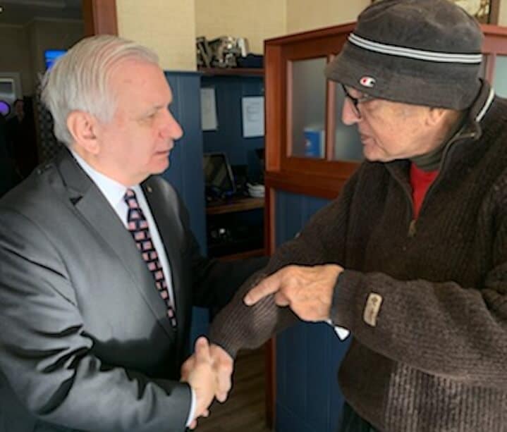 [CREDIT: Courtesy Kim Wineman] From left, U.S. Sen. Jack Reed speaks with a veteran during Iggy's free Veterans Day breakfast Saturday, Nov. 11, 2023.