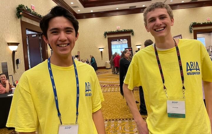 [CREDIT: Rob Borkowski] ARIA volunteers Julius Piercanuzi and Luke Patterson were canvassing the event, asking people about their experiences at the RI Author Expo at Crowne Plaza Warwick Saturday.